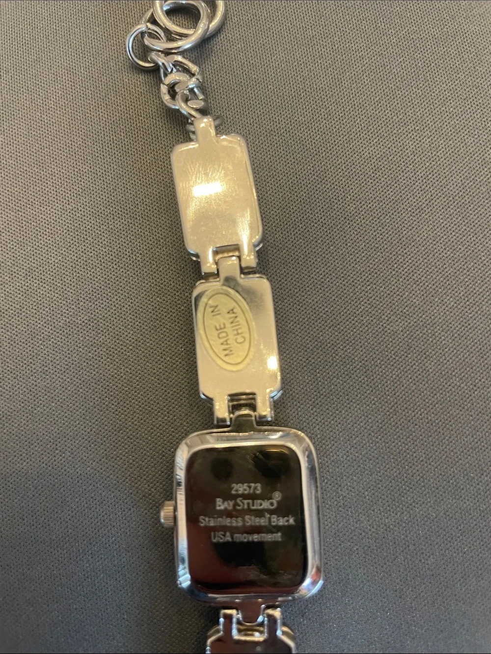 Vintage Bay Studio Silver-Tone Bracelet Watch with Red Faceted Stones